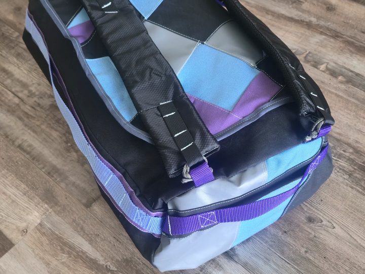 Heritage travel bag handcrafted from a customer's cherished garments