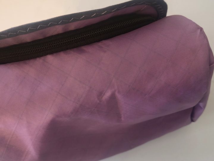 Packable travel pouch sewn from repurposed clothing
